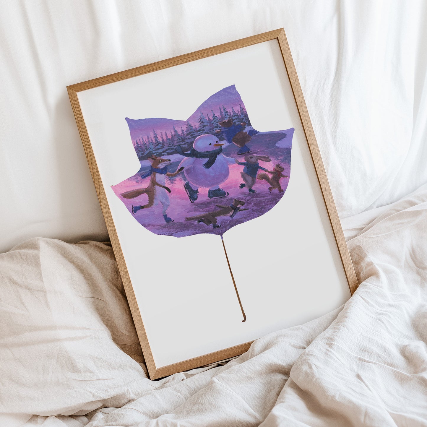 framed artwork of a leaf with woodland animals painted in