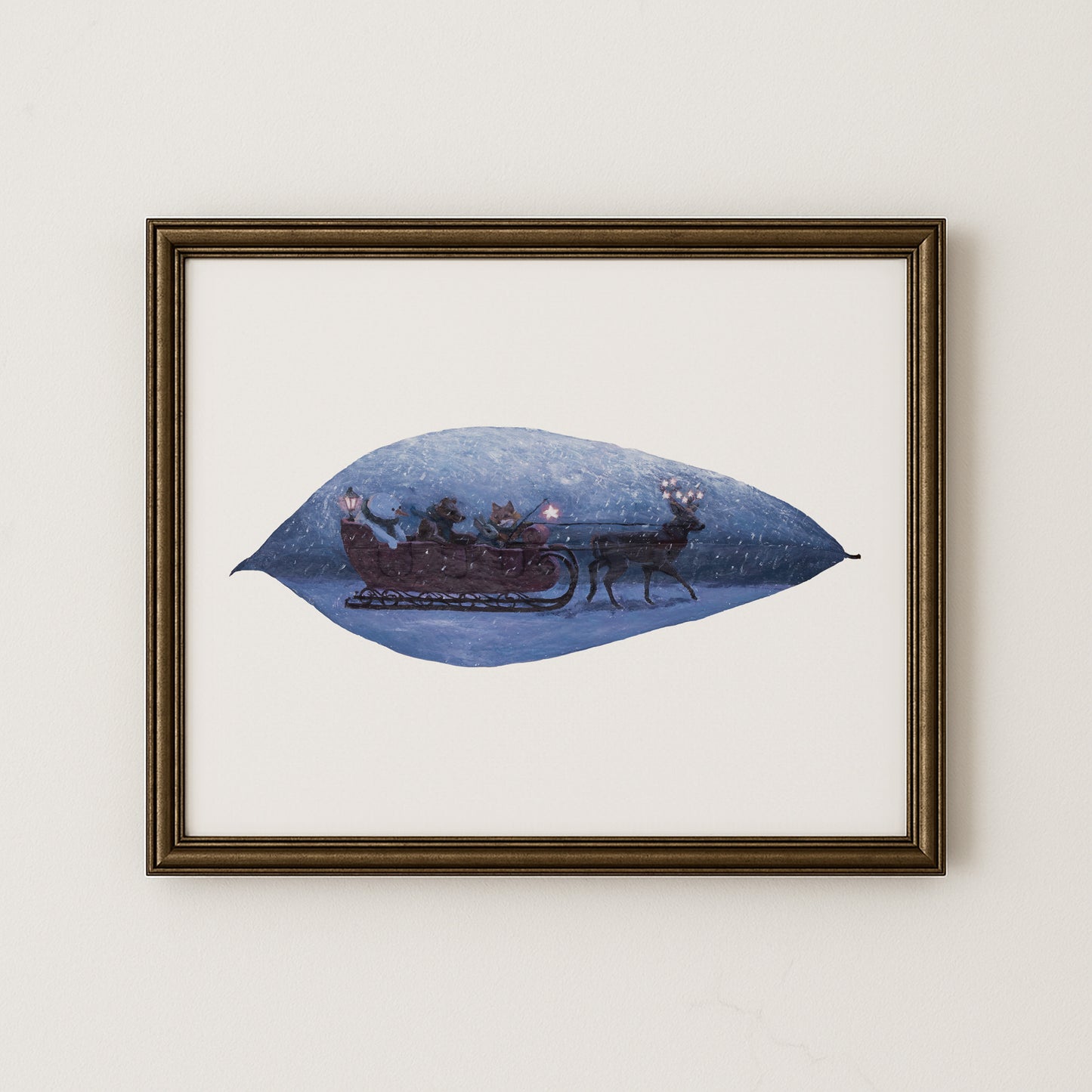 art print of woodland animals in a sleigh in a snowy setting in a frame