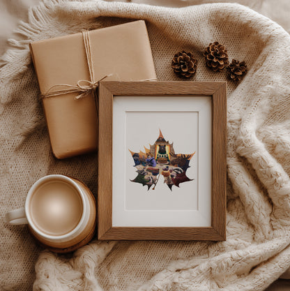 Framed artwork with a leaf design, wrapped gift, and mug on a textured surface