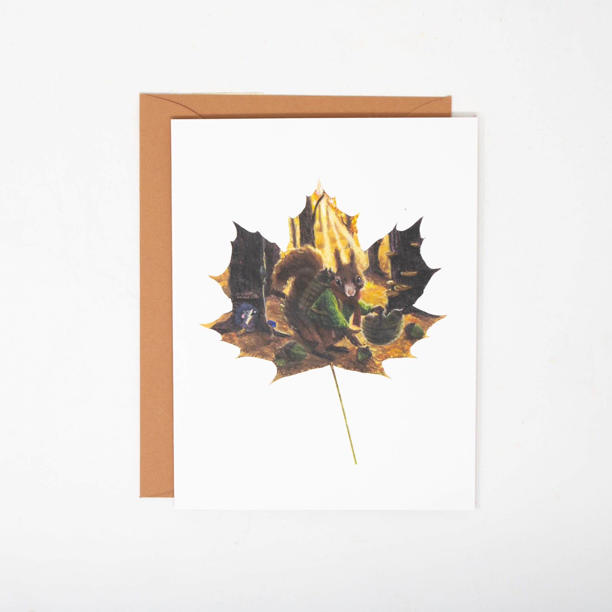 greeting card with a squirrel and a orange envelope
