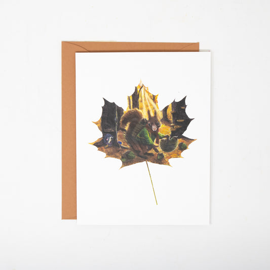 greeting card with a squirrel and a orange envelope