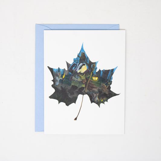 greeting card with a badger and squirrel at night with a light blue envelope