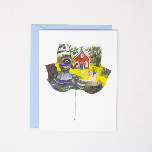 greeting card of a leaf painting with a raccoon going to school.